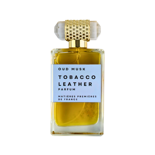 Perfume bottle labeled 'Tobacco Leather' by Matieres Premiere de France on a white background