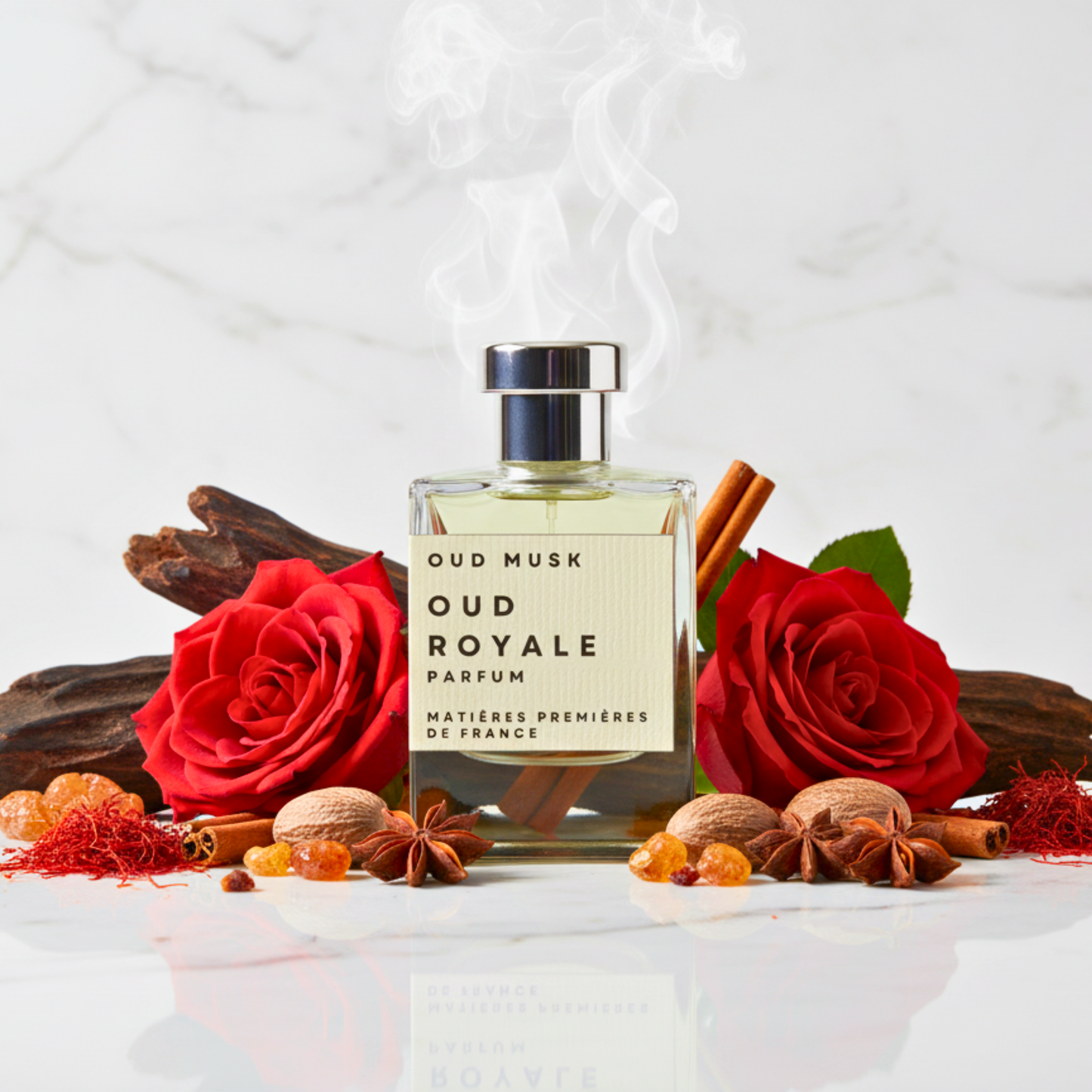 Oud Musk Oud Royale perfume bottle surrounded by red roses and spices on a white surface.